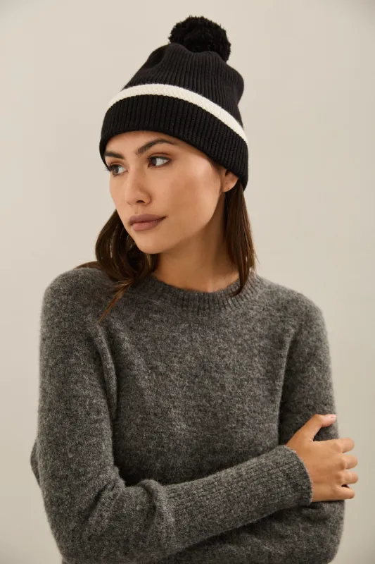 Hat with pompom sold by Tristan Style