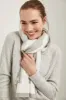 Cable-knit scarf sold by Tristan Style