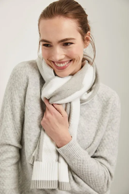 Cable-knit scarf sold by Tristan Style