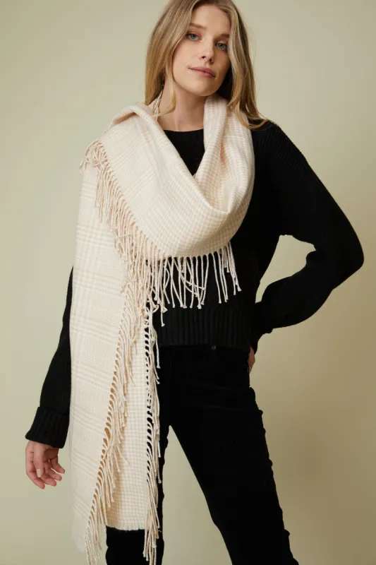 Scarf with fringes sold by Tristan Style