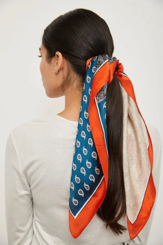 Silk scarf with orange edge sold by Tristan Style