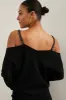 Off shoulder V neck sweater sold by Tristan Style
