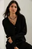 Long cardigan with shoulder inserts sold by Tristan Style