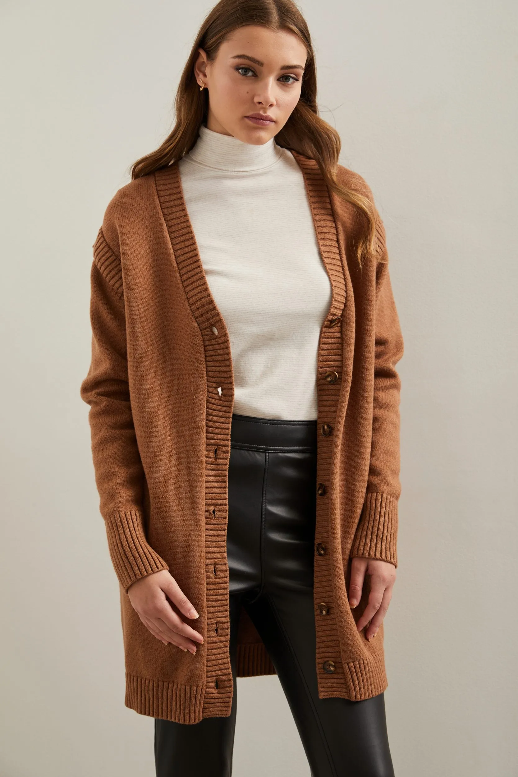 Long cardigan with shoulder inserts sold by Tristan Style