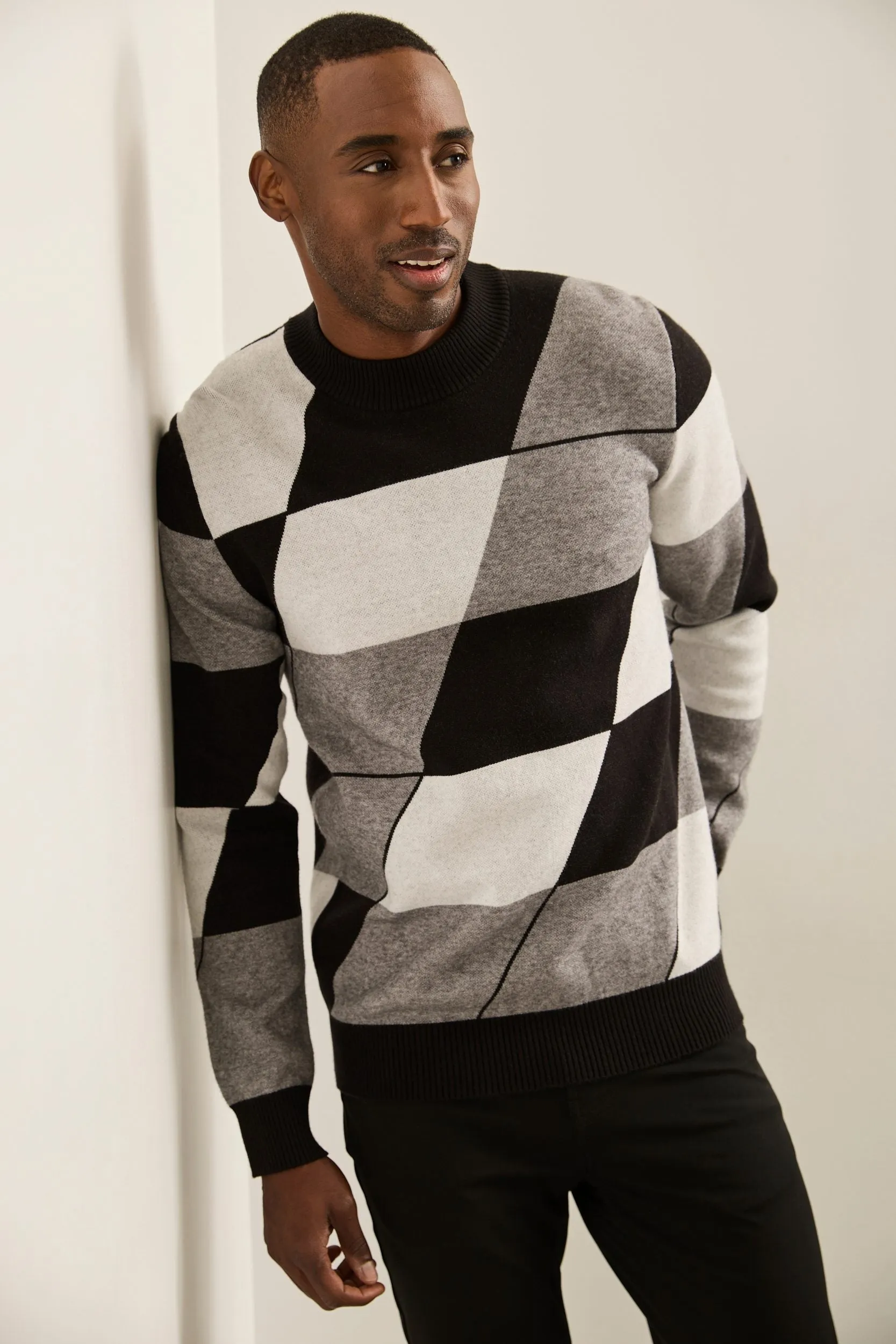 Argyle jacquard mock neck swea sold by Tristan Style
