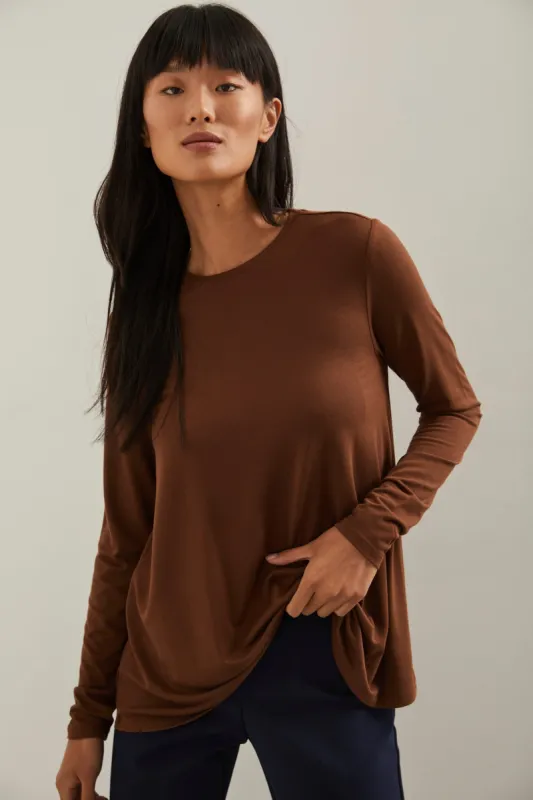 Long sleeve flared t-shirt sold by Tristan Style