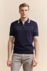 Contrasting details knitted polo sold by Tristan Style