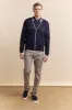 Contrasting details knitted polo sold by Tristan Style