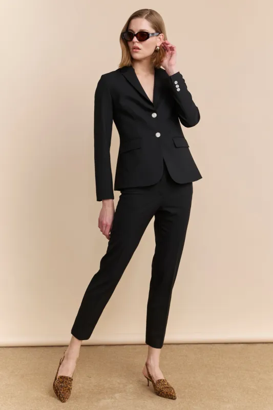 Semi-fitted black blazer sold by Tristan Style