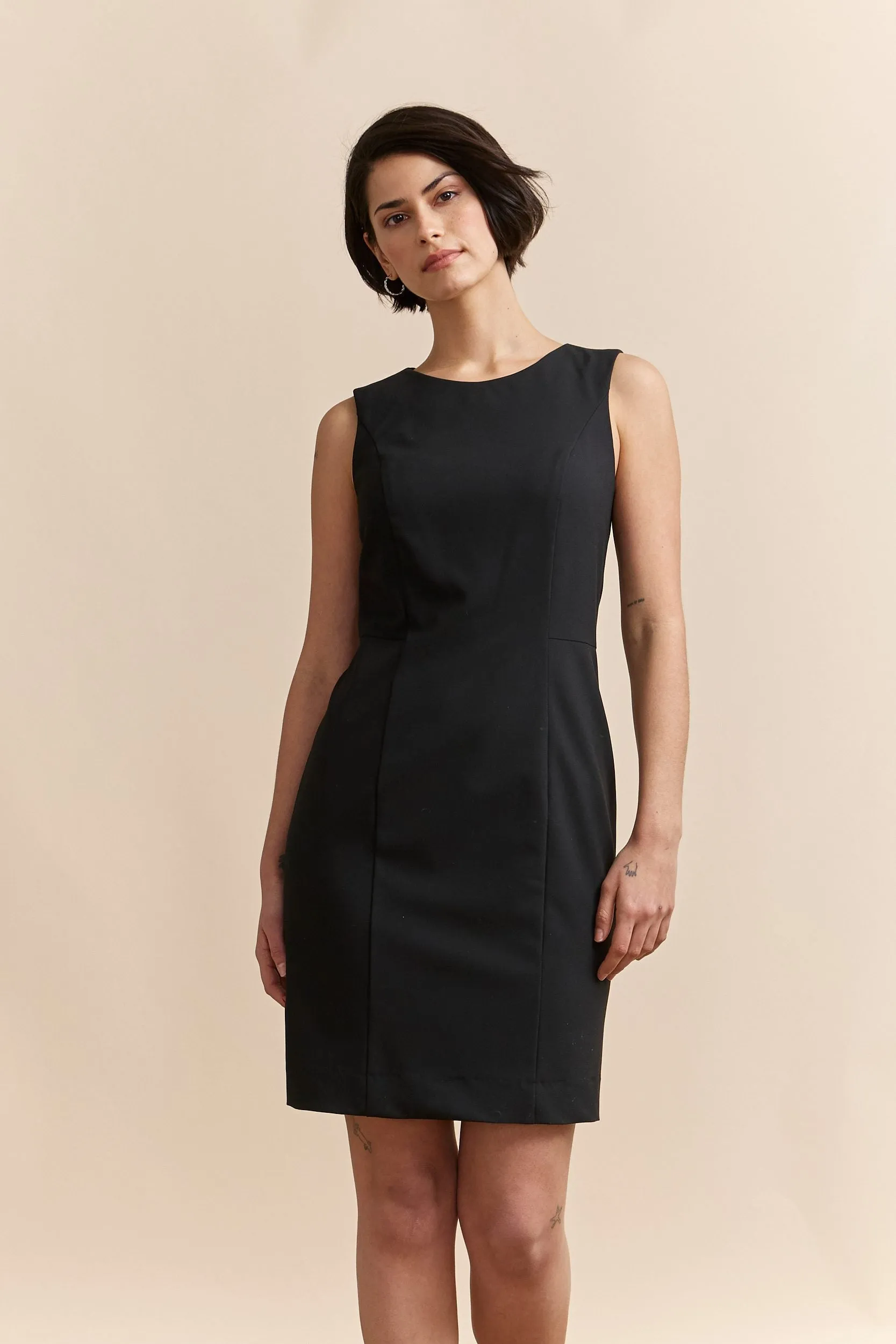 Fitted black dress sold by Tristan Style