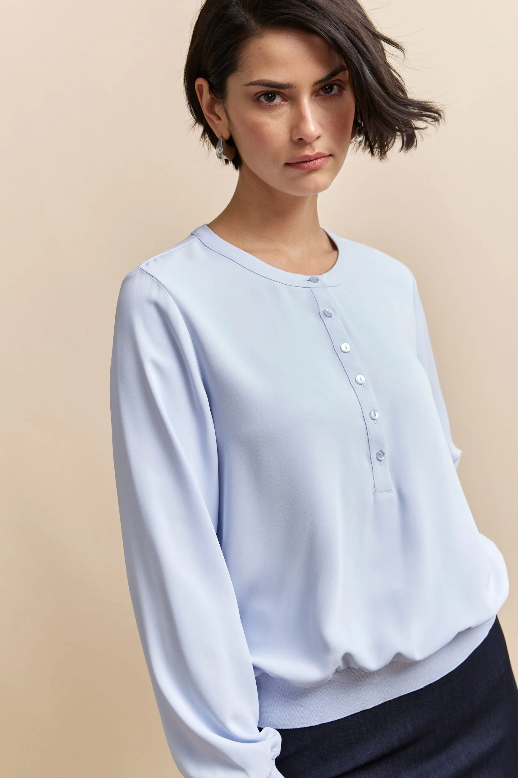 Henley blouse sold by Tristan Style