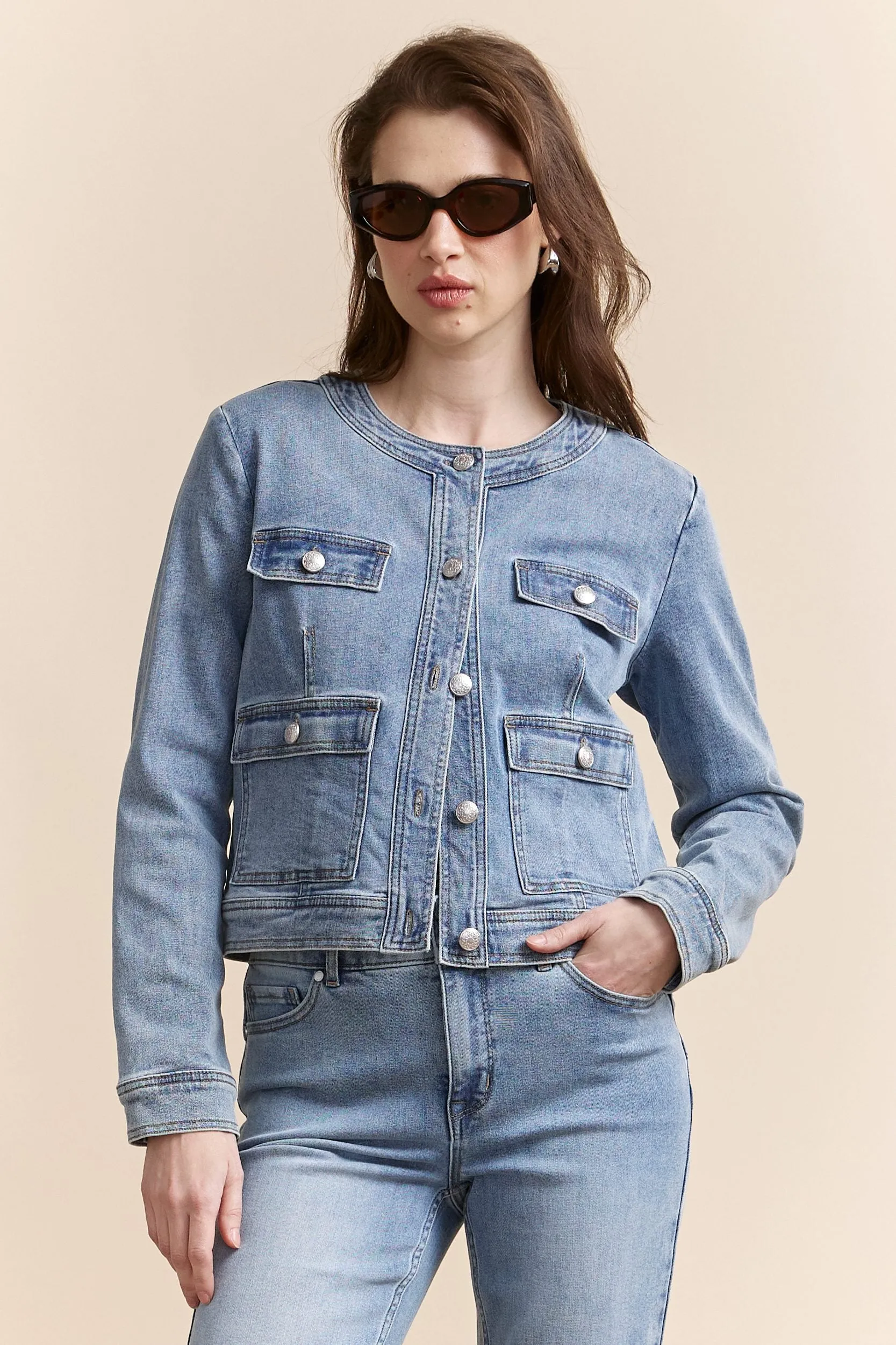 Denim jacket with applied pockets sold by Tristan Style