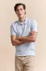 Polo with detail at collar sold by Tristan Style