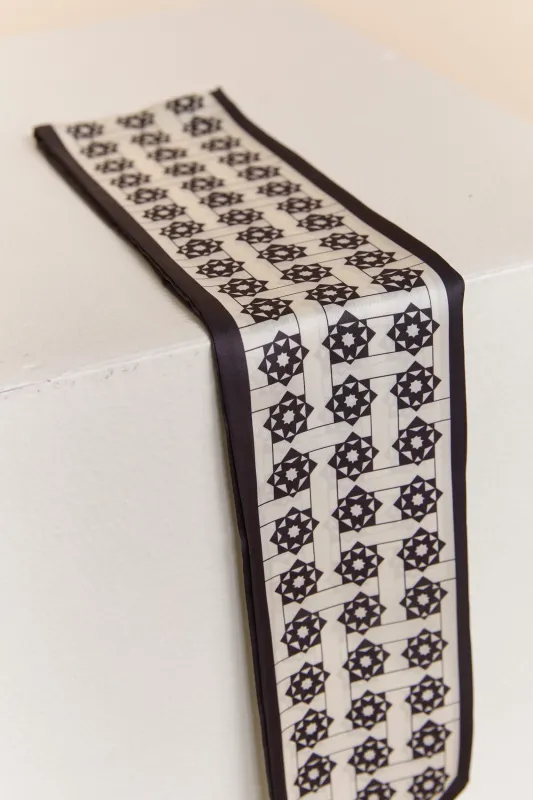 Multi-print scarf sold by Tristan Style