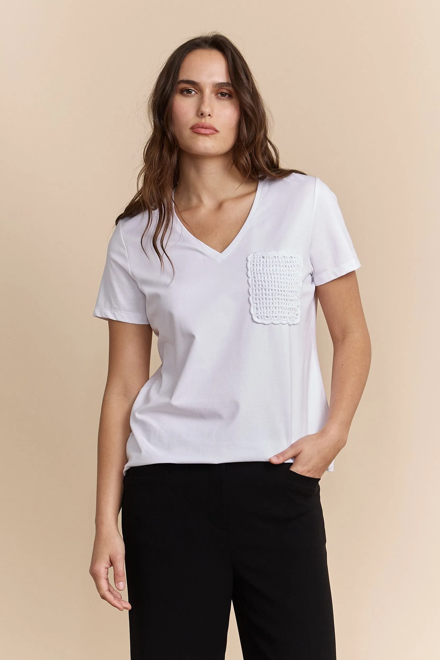 T-shirt with crochet pocket sold by Tristan Style