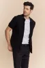 Cable knit front short sleeve cardigan sold by Tristan Style