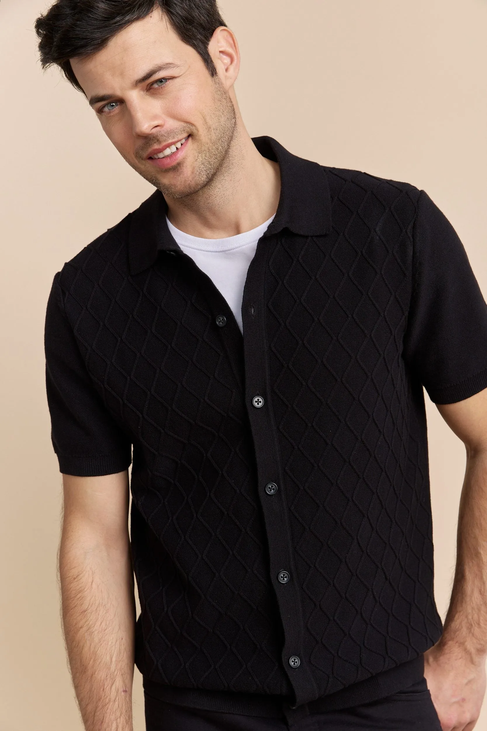 Cable knit front short sleeve cardigan sold by Tristan Style