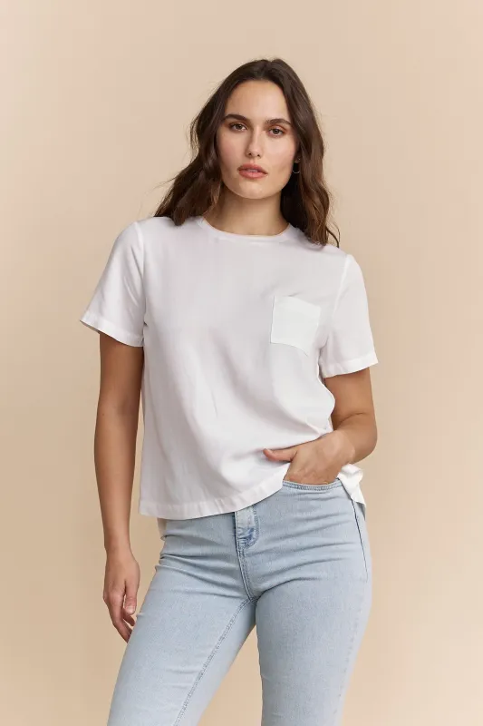 Loose-fitting top with neck detail sold by Tristan Style