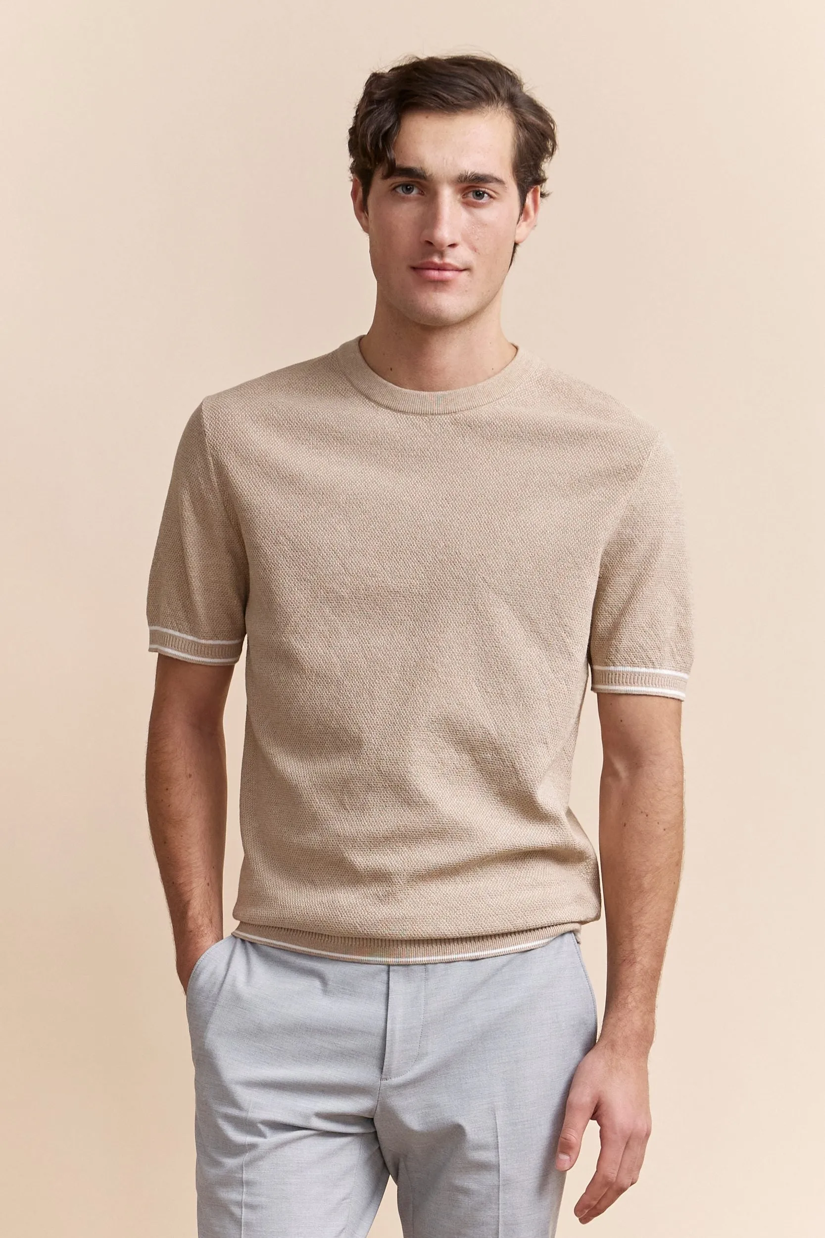 Short sleeves textured sweater sold by Tristan Style