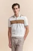 Color block knitted polo sold by Tristan Style