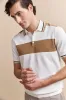 Color block knitted polo sold by Tristan Style