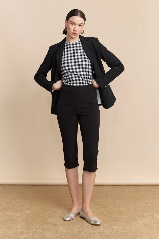 High waist capri with slit sold by Tristan Style