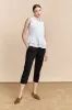Sleeveless blouse with frills sold by Tristan Style