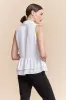 Sleeveless blouse with frills sold by Tristan Style