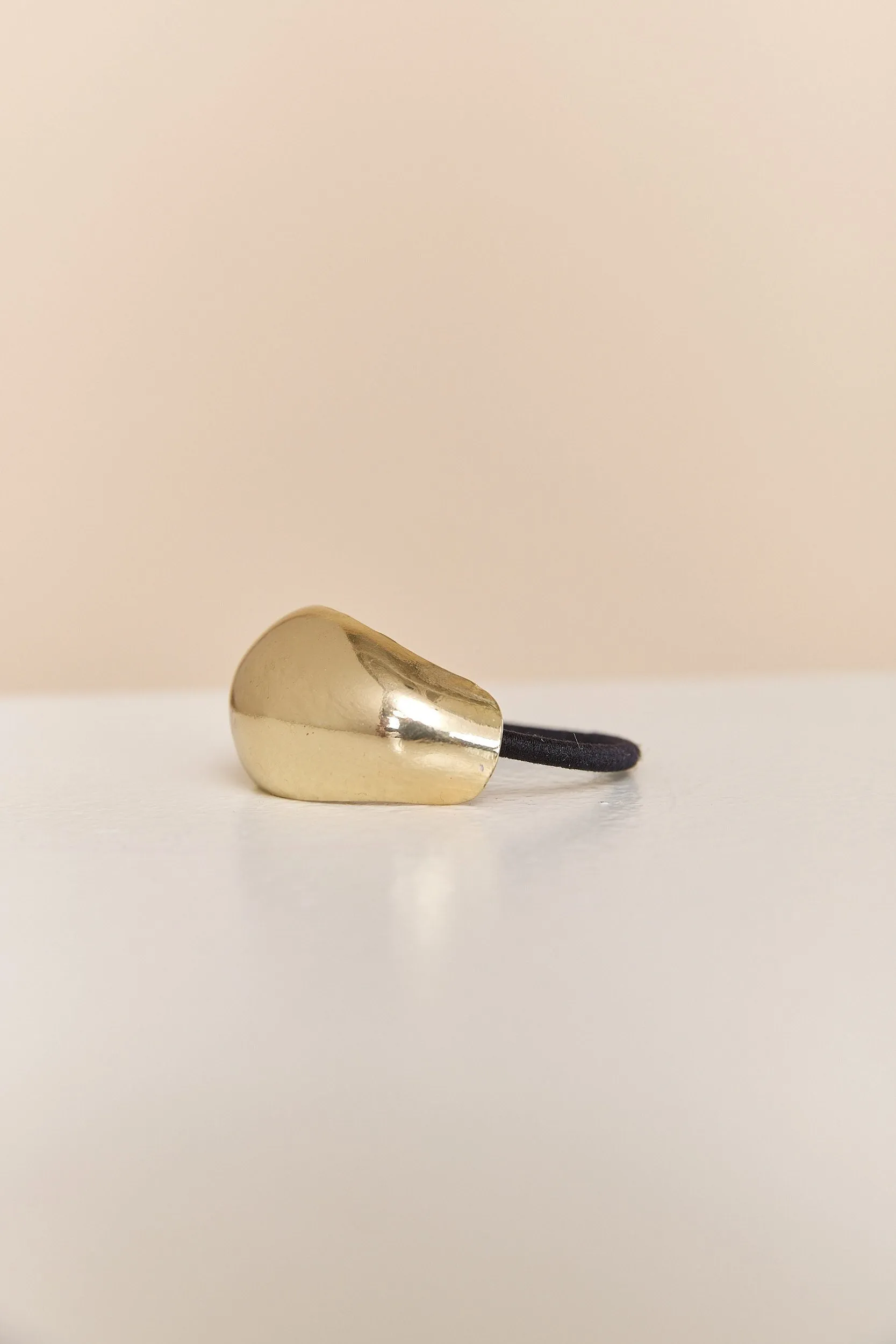 Metal hair tie sold by Tristan Style