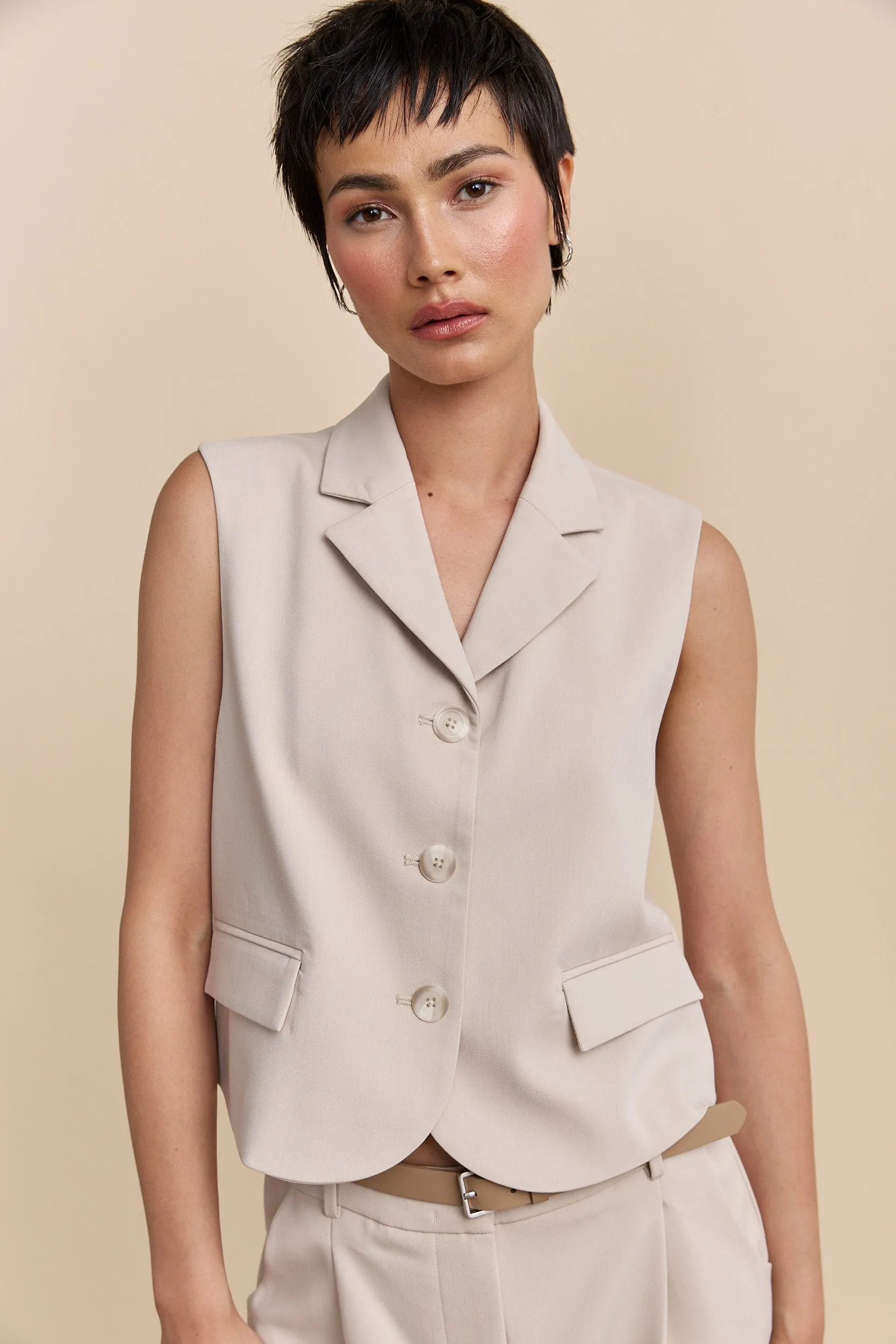 Sleeveless vest sold by Tristan Style product image thumbnail 3