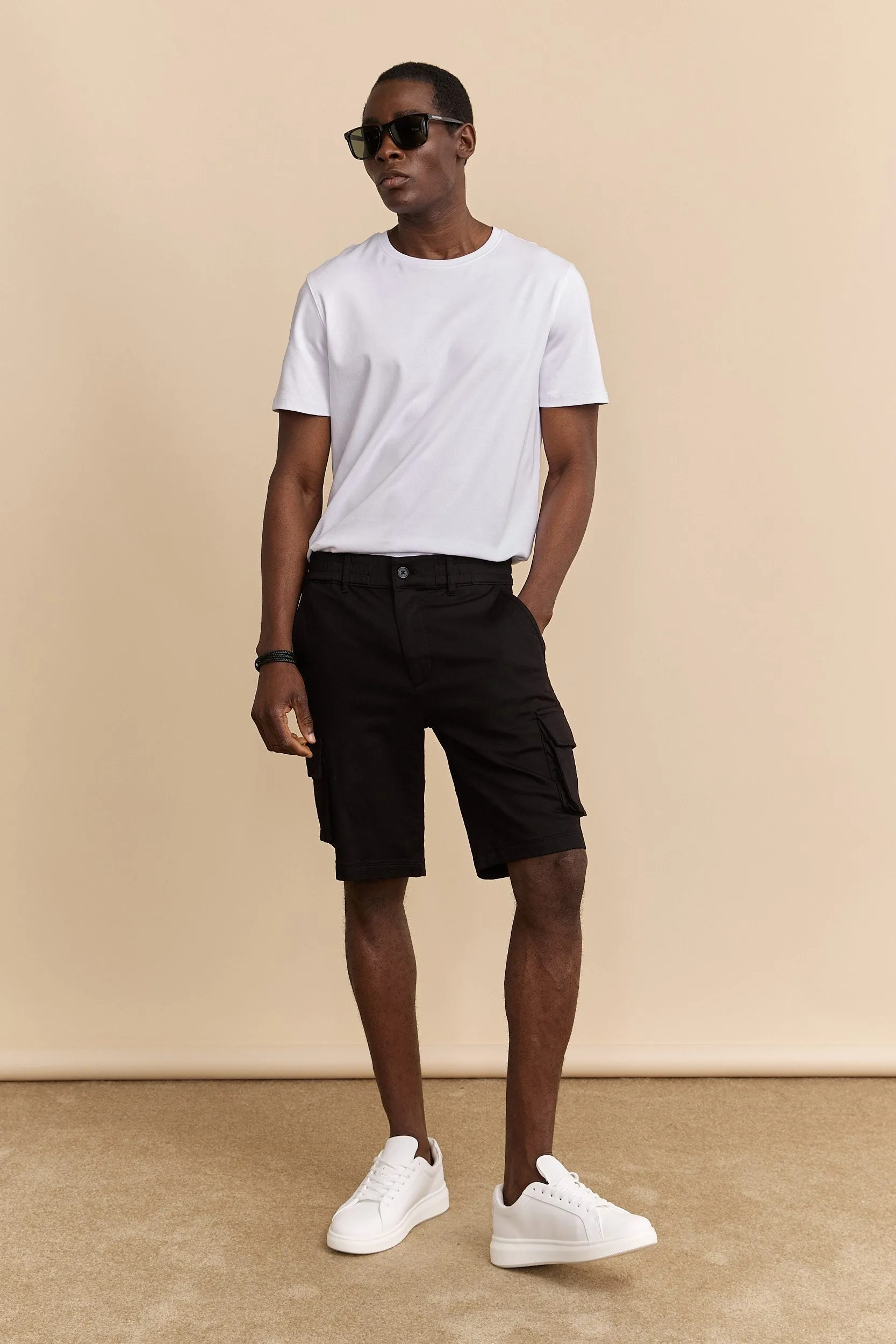 Cargo shorts with pockets sold by Tristan Style