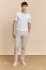 Textured vertical stripes polo sold by Tristan Style