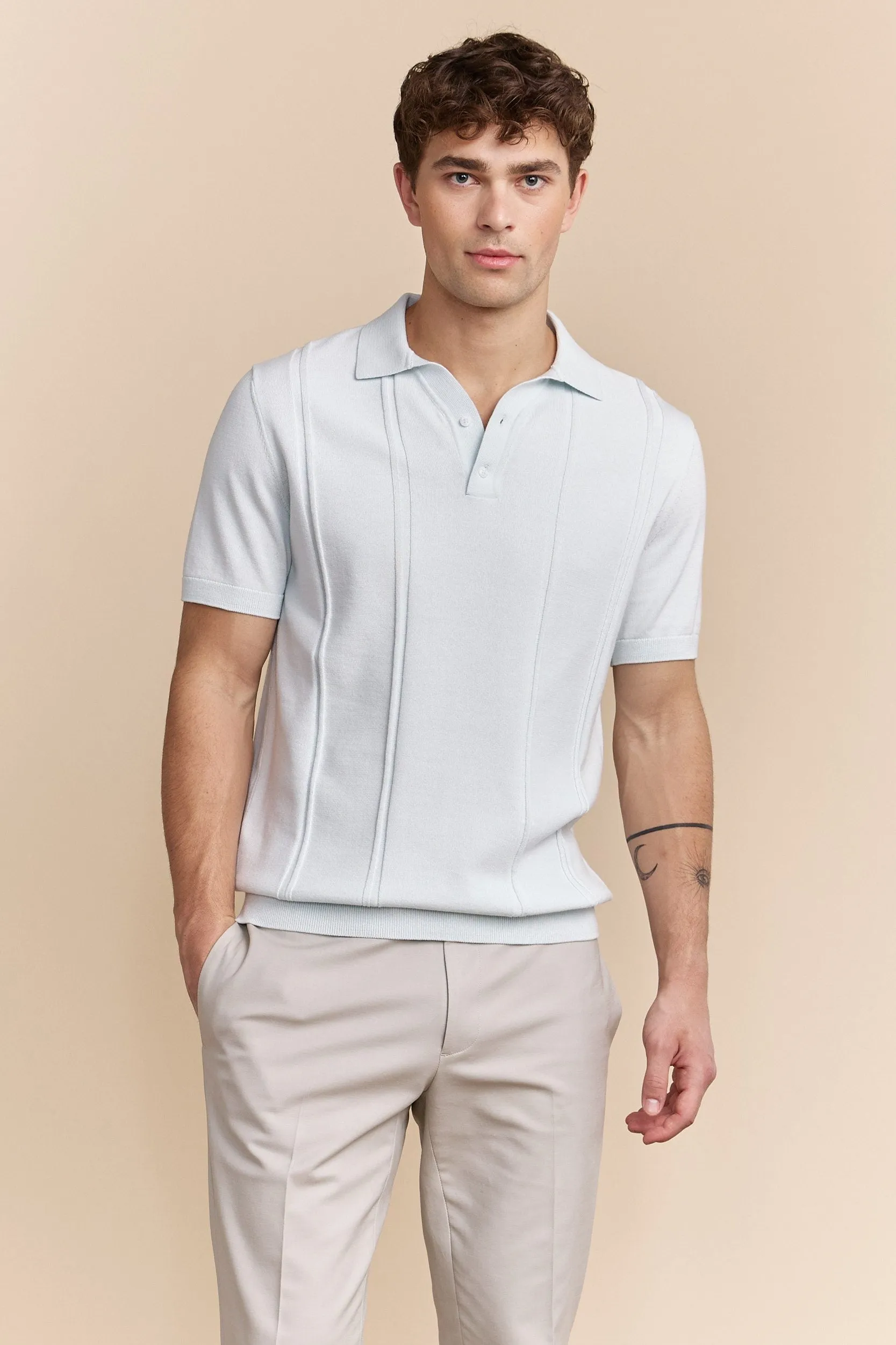 Textured vertical stripes polo sold by Tristan Style