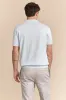 Textured vertical stripes polo sold by Tristan Style