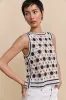 Sleeveless crochet top sold by Tristan Style