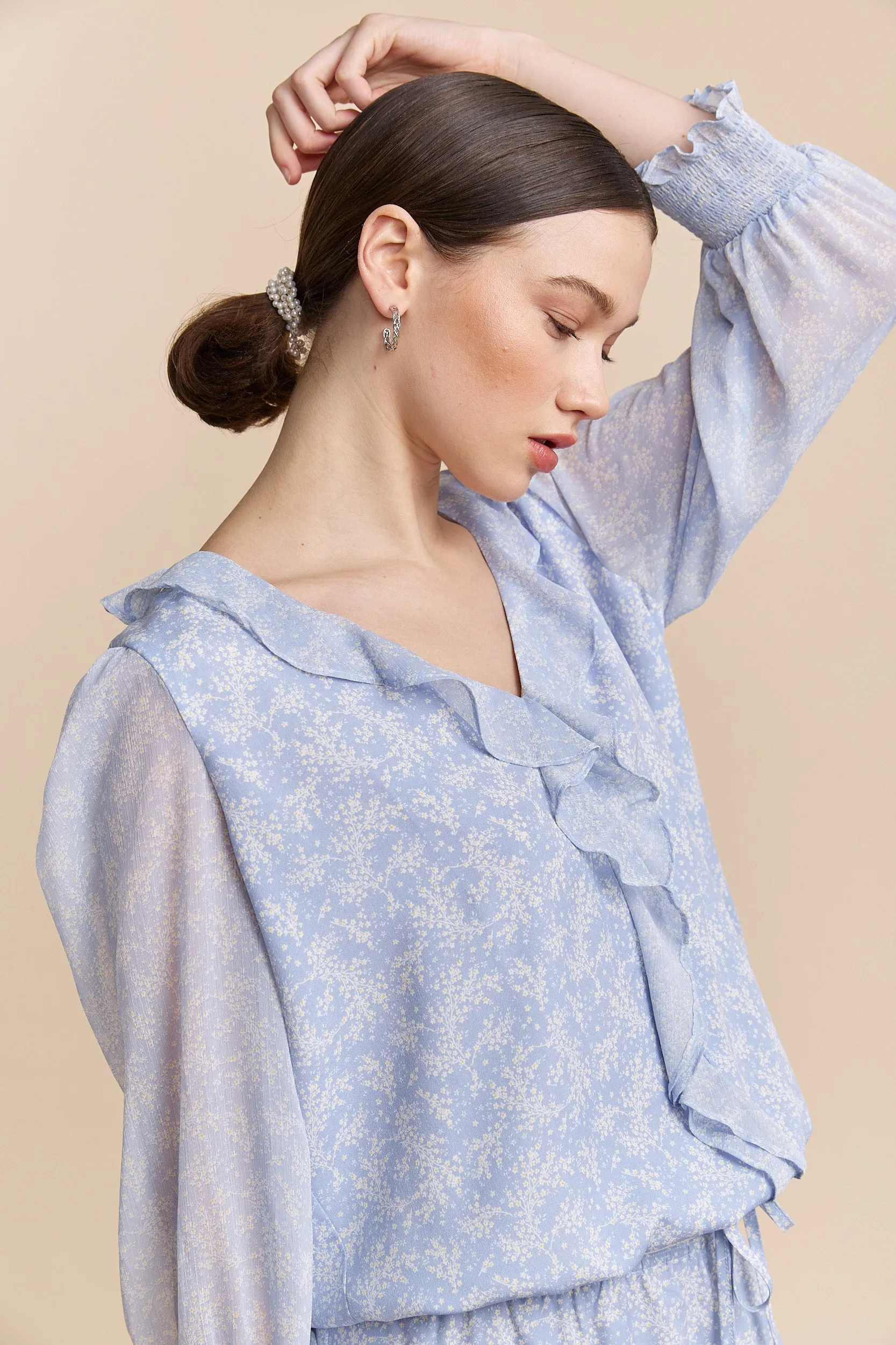 Floral printed blouse with frills sold by Tristan Style