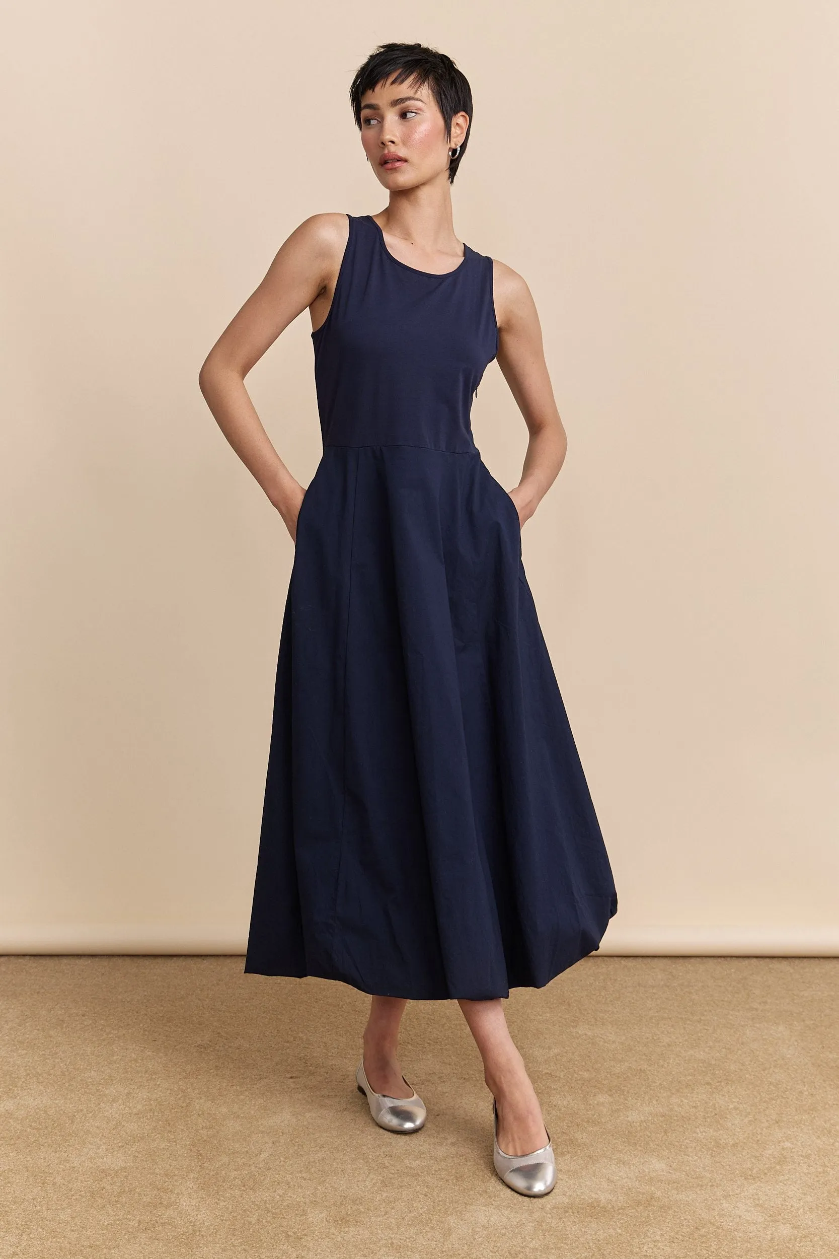 Mixed-fabric balloon dress sold by Tristan Style