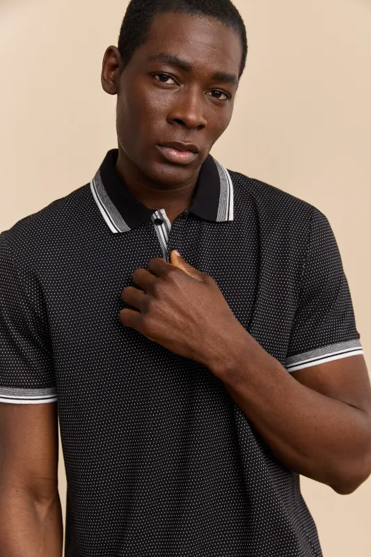 Polo with contrasting details sold by Tristan Style