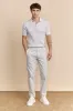 Slim fit pants with elastic sides sold by Tristan Style