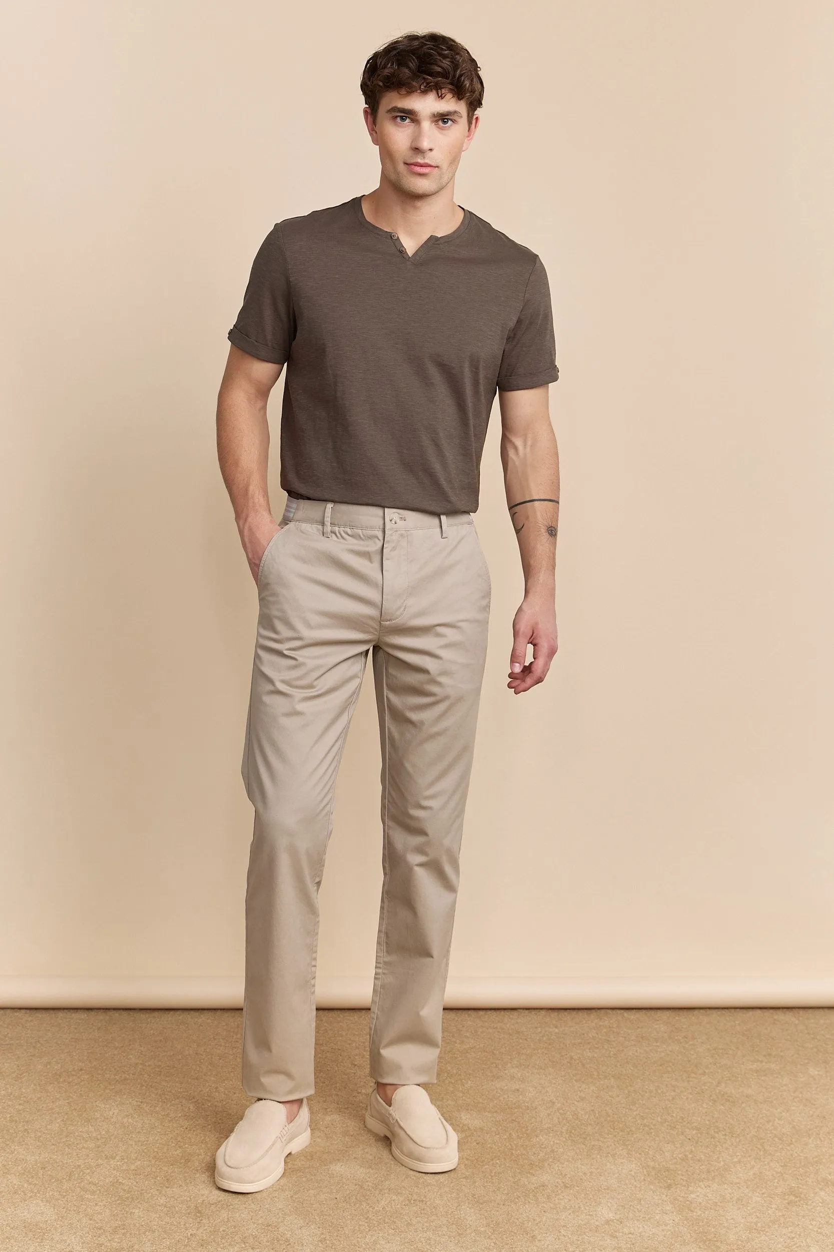 Slim fit pants with elastic sides sold by Tristan Style