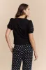 Short sleeve top with mesh insert sold by Tristan Style