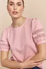 Short sleeve top with mesh insert sold by Tristan Style