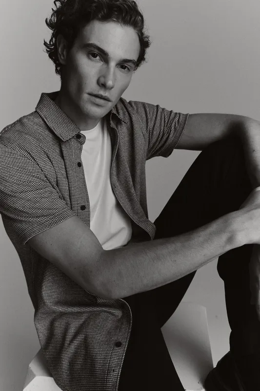 Houndstooth knit shirt sold by Tristan Style