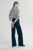 Striped oversize sweater sold by Tristan Style