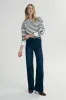 Striped oversize sweater sold by Tristan Style