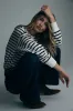 Striped oversize sweater sold by Tristan Style