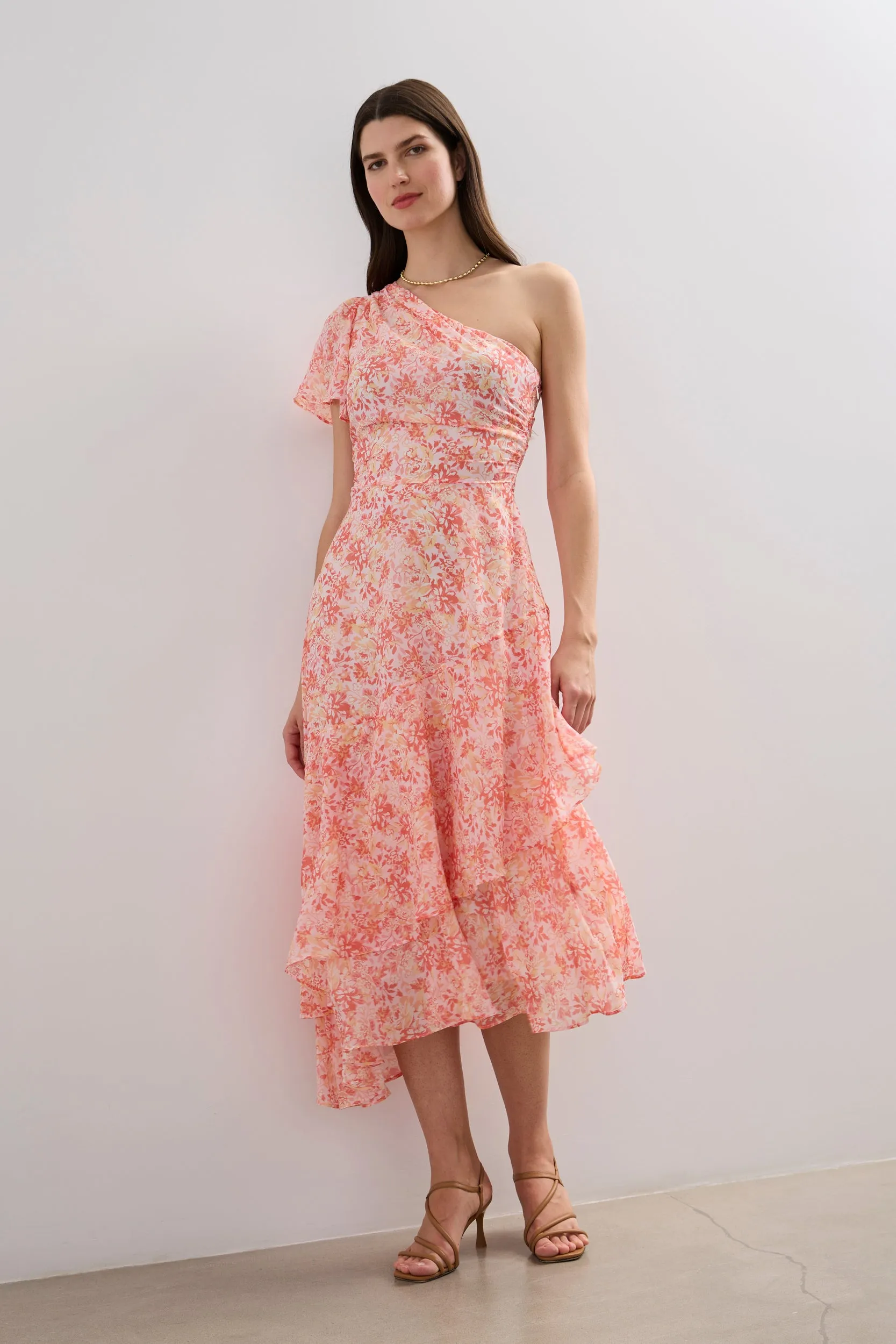 Floral printed asymmetric fluid dress sold by Tristan Style