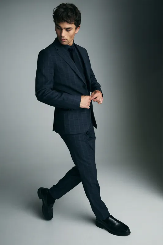Extra-fitted check blazer sold by Tristan Style