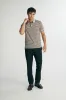 Short sleeve striped polo sold by Tristan Style