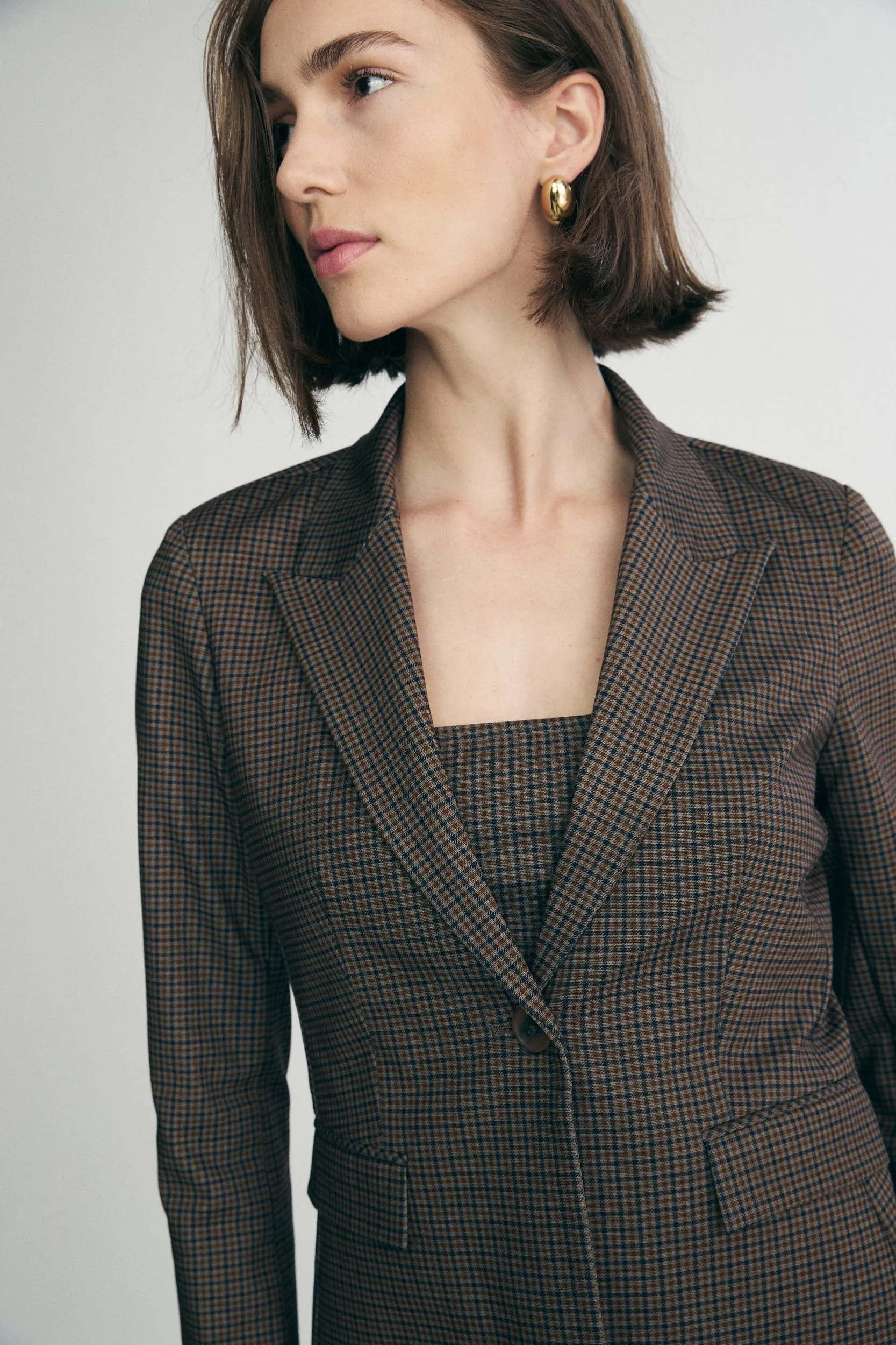 Fitted plaid jacket sold by Tristan Style